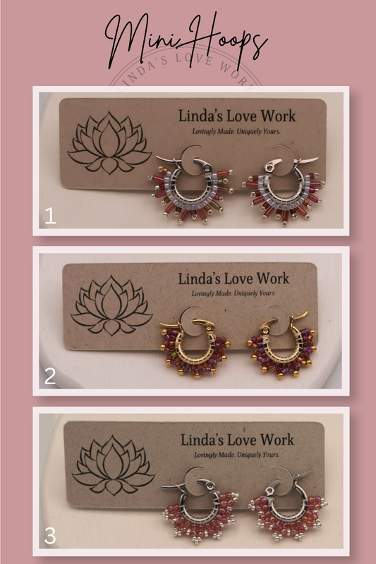 Three pairs of hoop earrings on cards with 'Linda's Love Work' branding against a pink background.