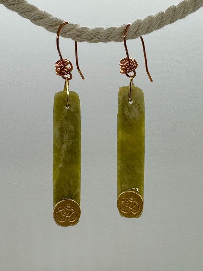 Gemstone Earrings worn in soft, natural light, showing how the gemstones catch the light and enhance the overall look.