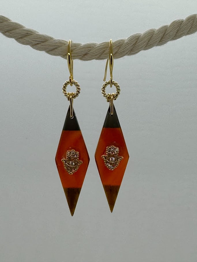 Gemstone Earrings worn outdoors or in soft lighting, emphasizing the natural shimmer and color of the gemstones.