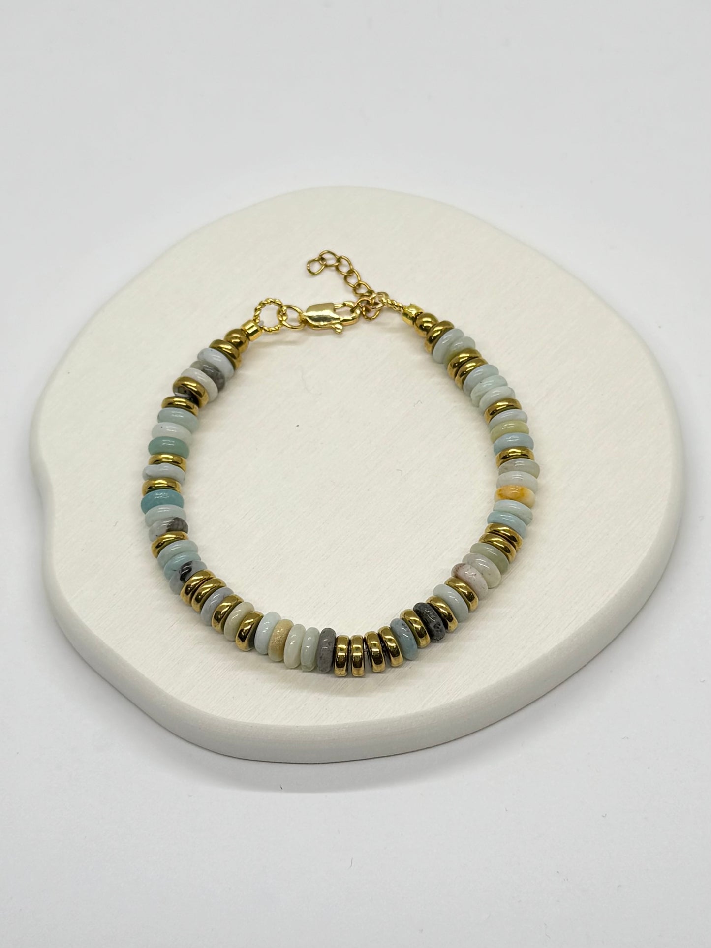 Bracelet with beaded design on a white surface