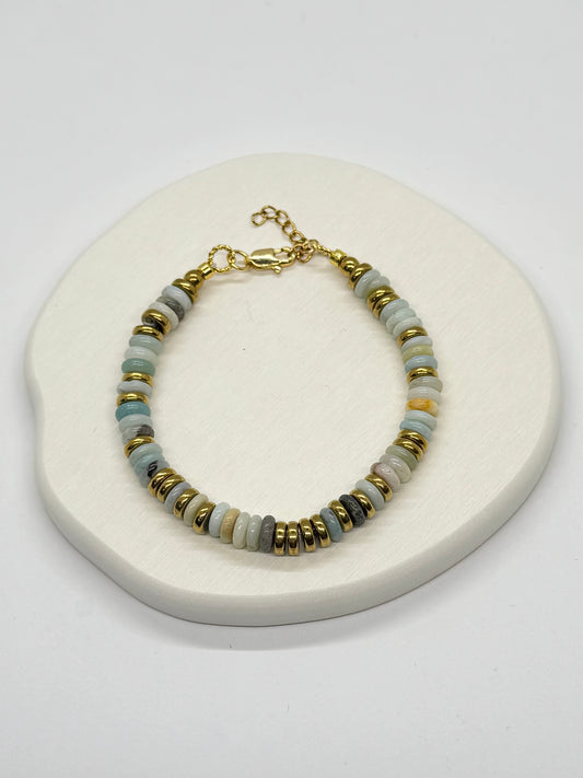 Bracelet with beaded design on a white surface