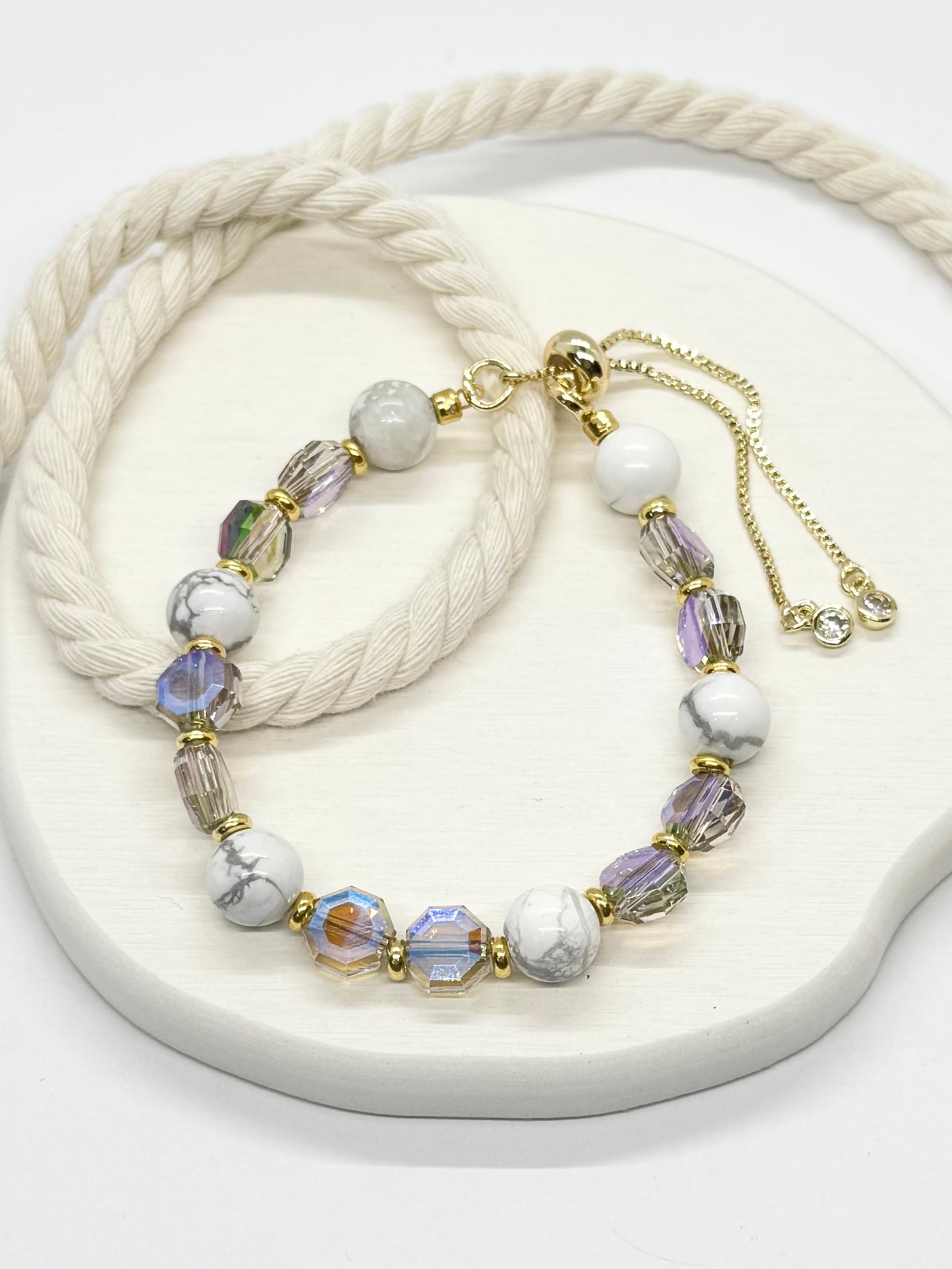 Bracelet with multicolored beads on a white surface