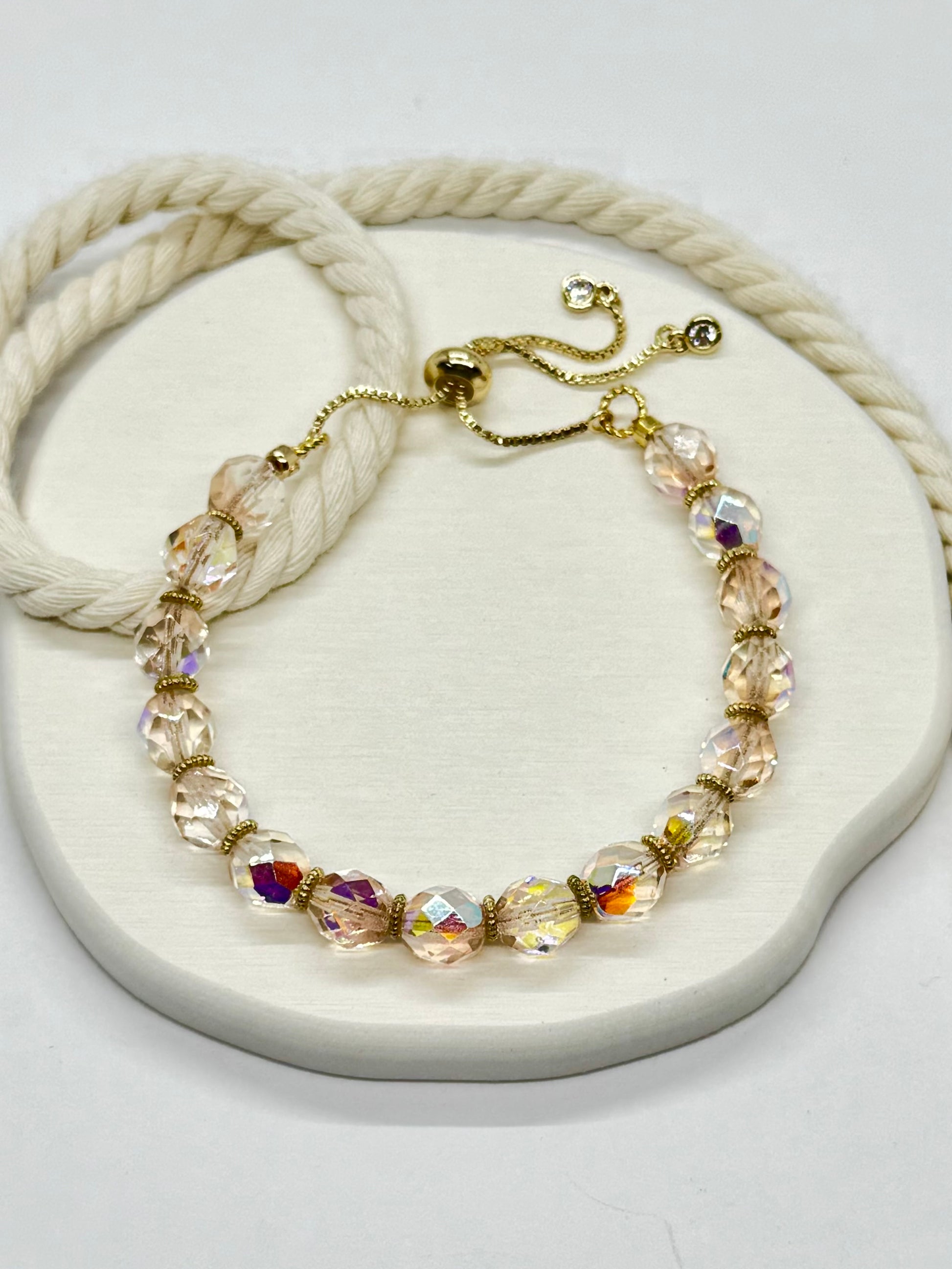 Bracelet with multicolored beads on a white surface