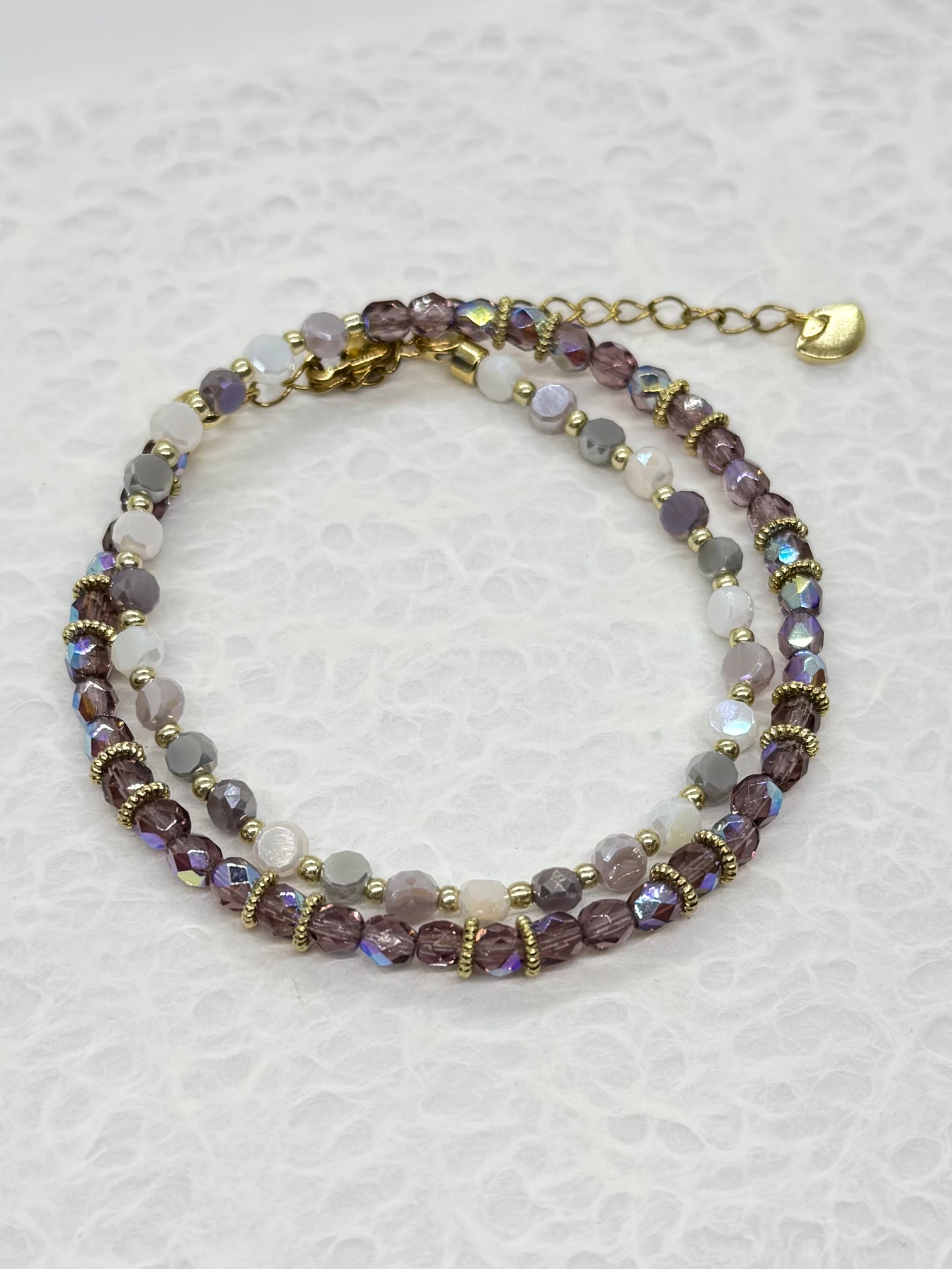 Multicolored beaded bracelet on a white background