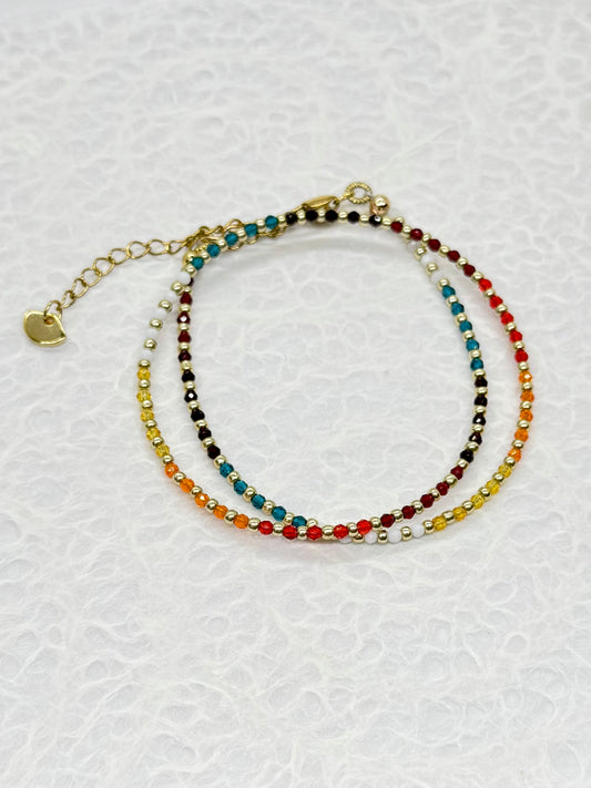 Multicolored beaded bracelet on a white background