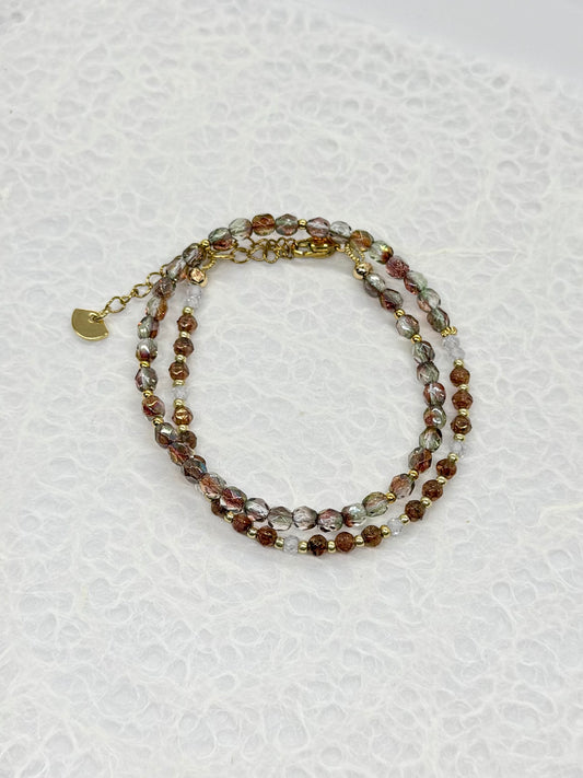 Beaded bracelet on a textured white background