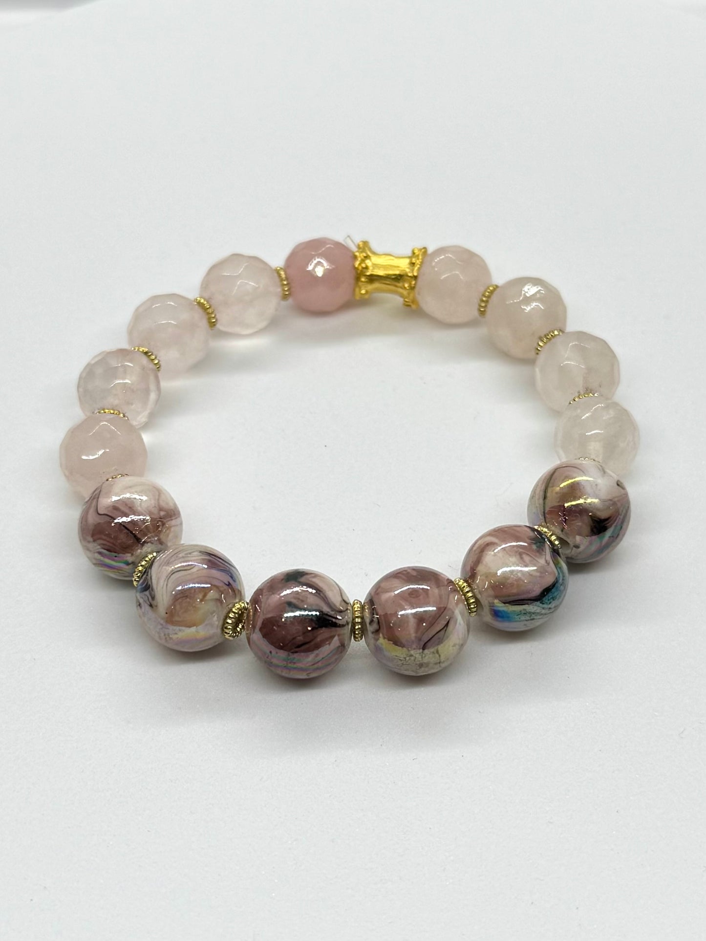 Bracelet with multicolored beads on a white background