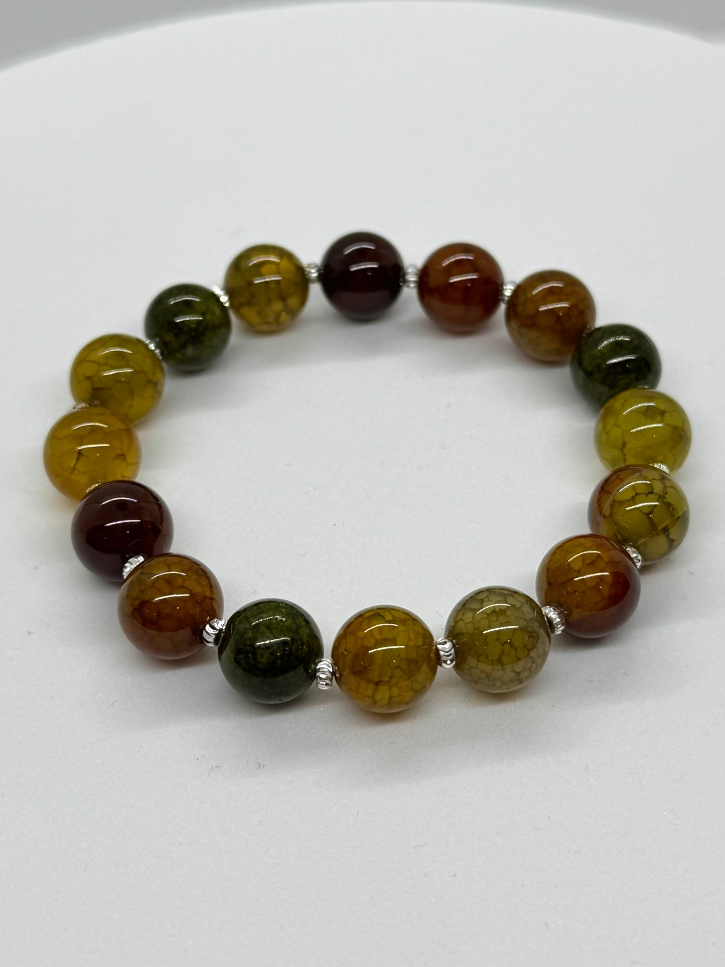 Multicolored beaded bracelet on a white background