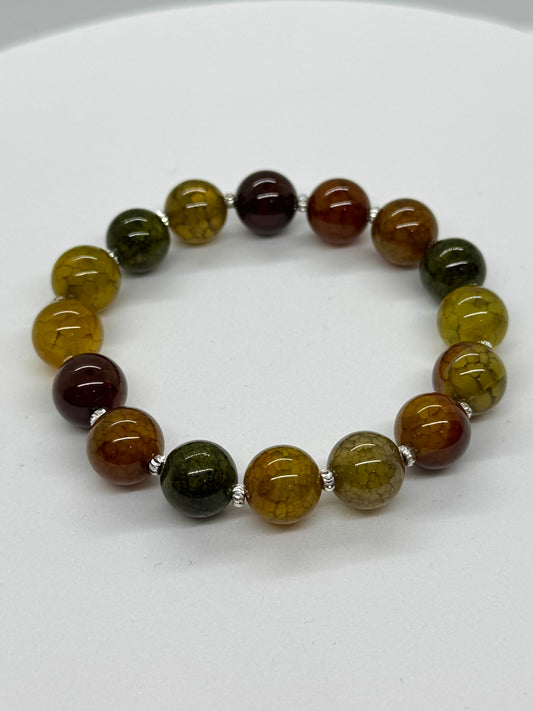 Multicolored beaded bracelet on a white background