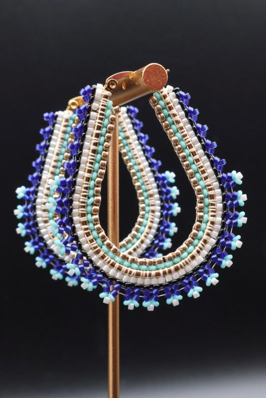 Beaded earrings on a black background