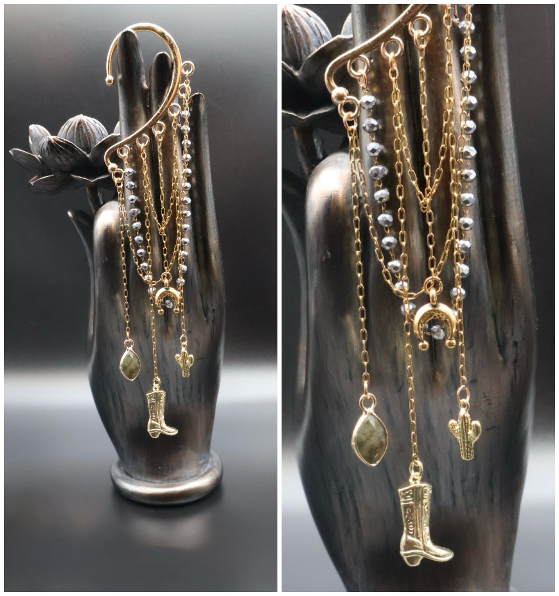 Gold and silver earrings with cowboy boot and cactus designs on a black hand-shaped stand.
