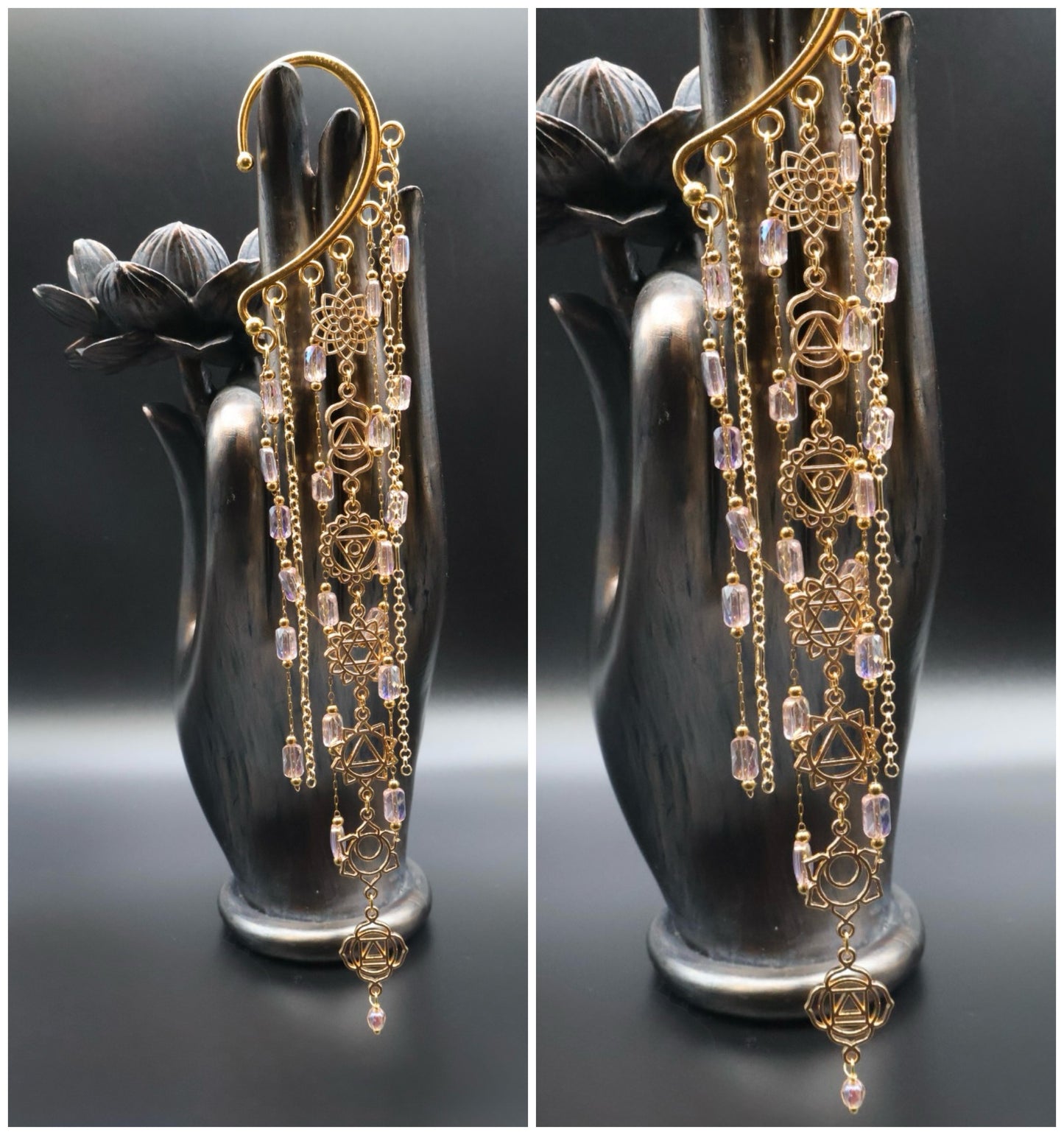 Gold and crystal earrings on a black hand-shaped stand against a dark background