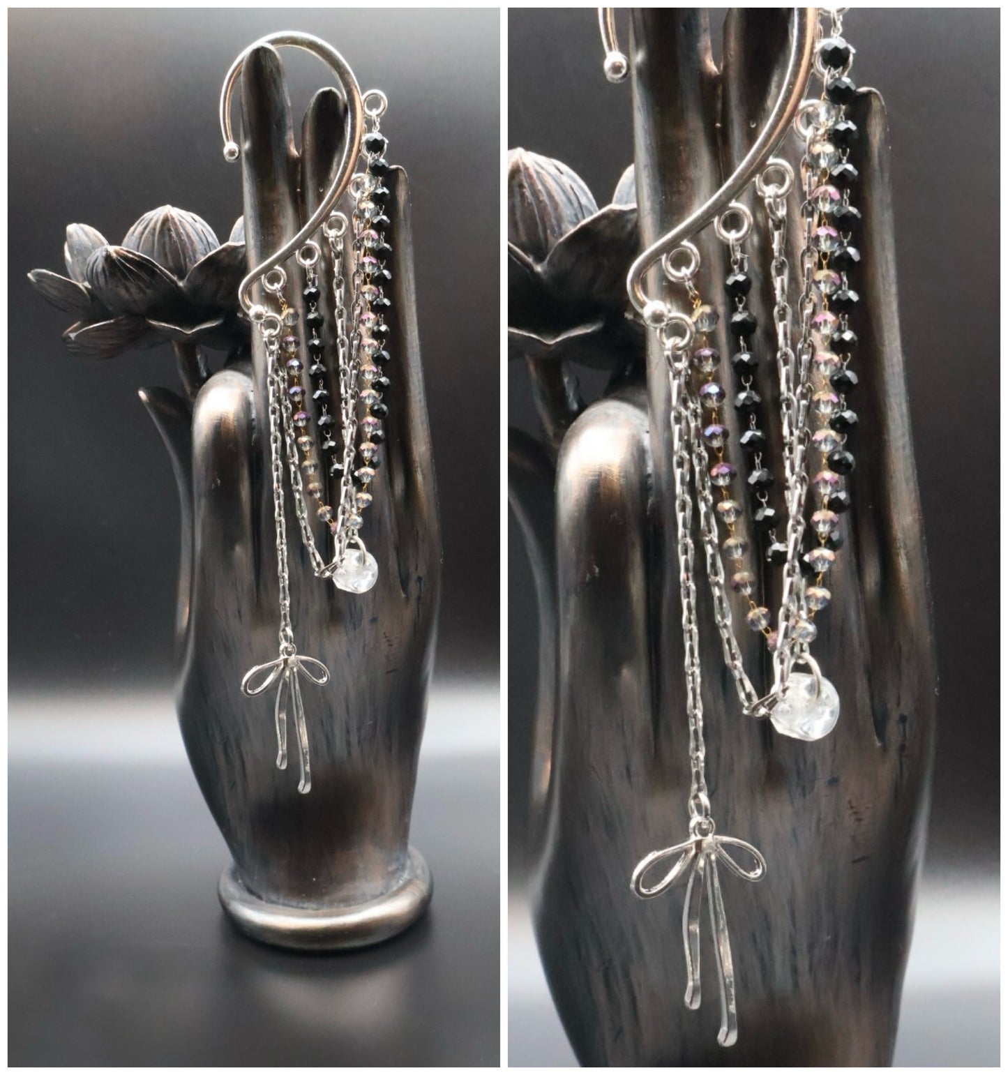 Silver chain earrings displayed on a decorative hand-shaped stand.