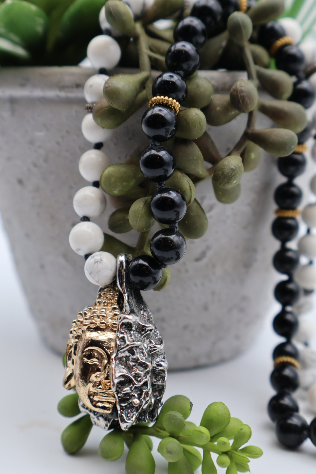 Three beaded bracelets with different color schemes on a white background