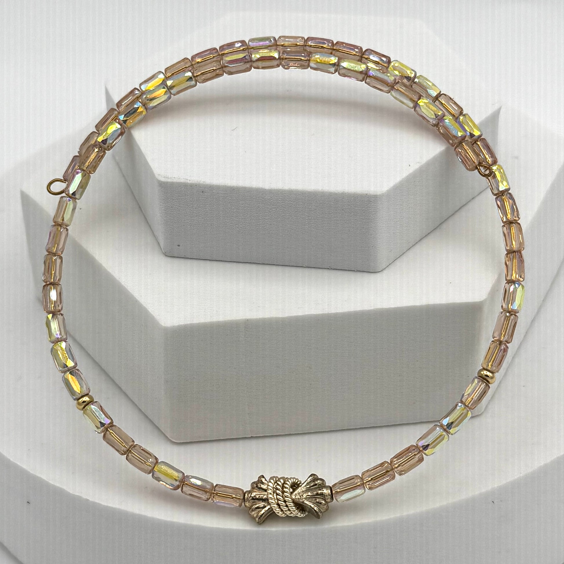 Necklace with multicolored beads on a white background