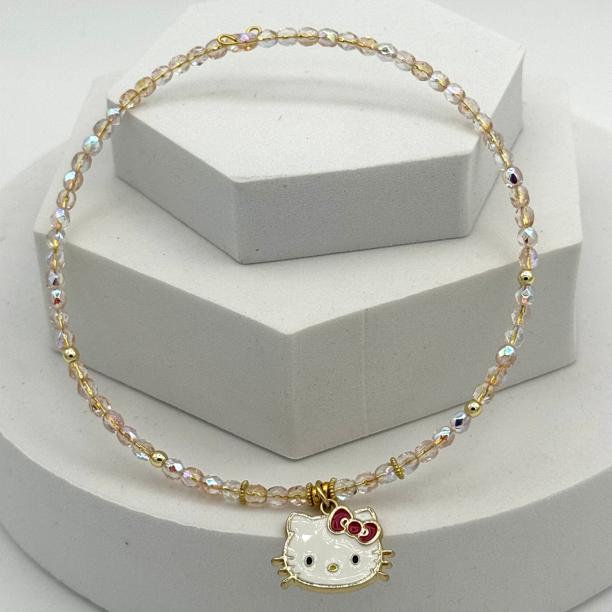 Bracelet with Hello Kitty charm on a white background