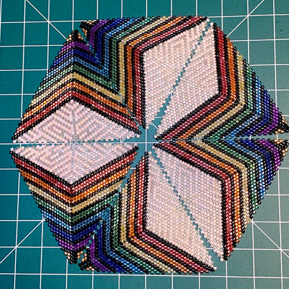 Geometric bead pattern on a grid background
