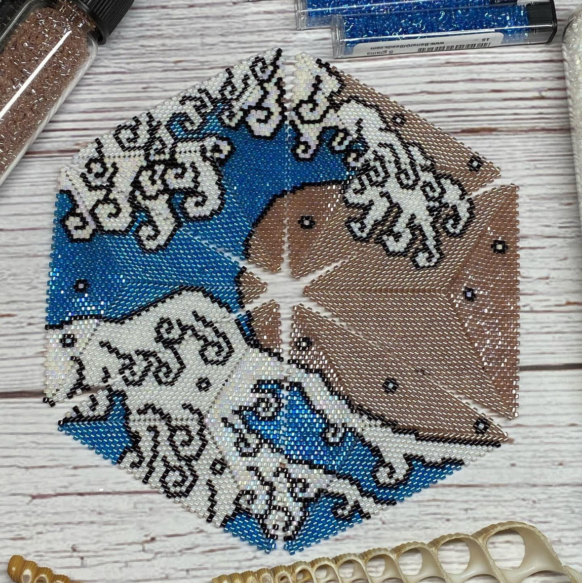 Decorative patch with wave design on a wooden surface