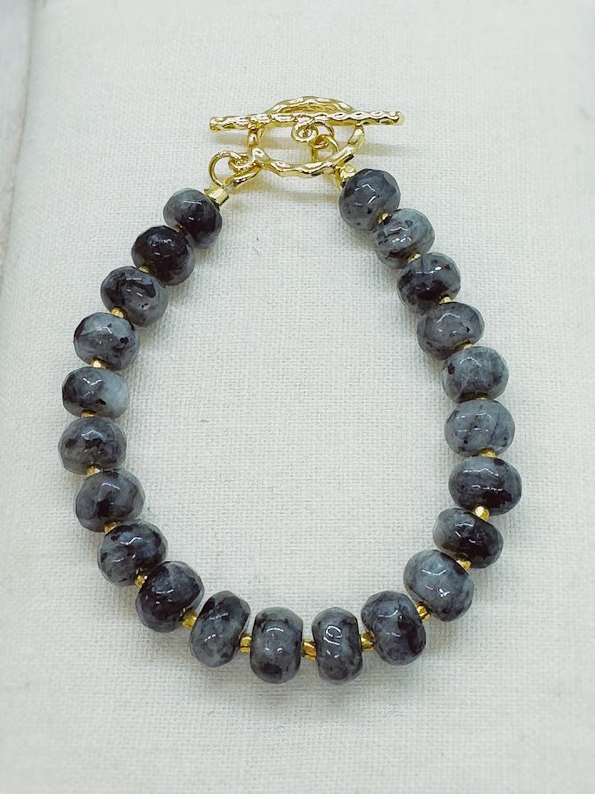 a bracelet with larvikite beads